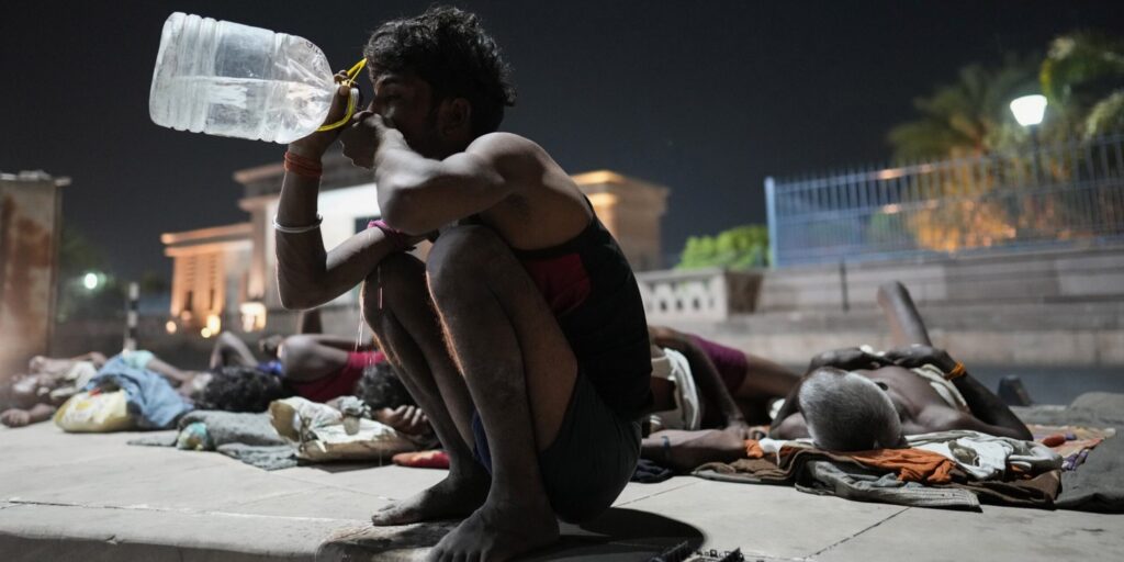 man drinking water