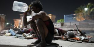 man drinking water